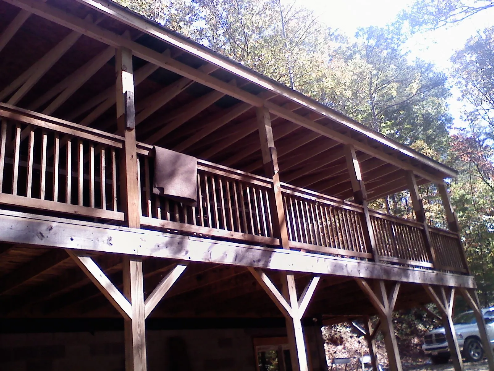 Timber framing under a new elevated porch and deck — Roof Leak Repair in Buckholts by Roofing Brothers